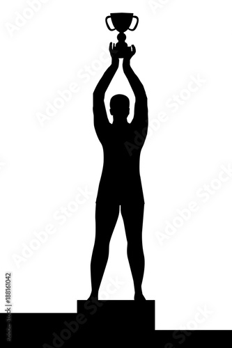 Man silhouette on podium  holding a championship trophy