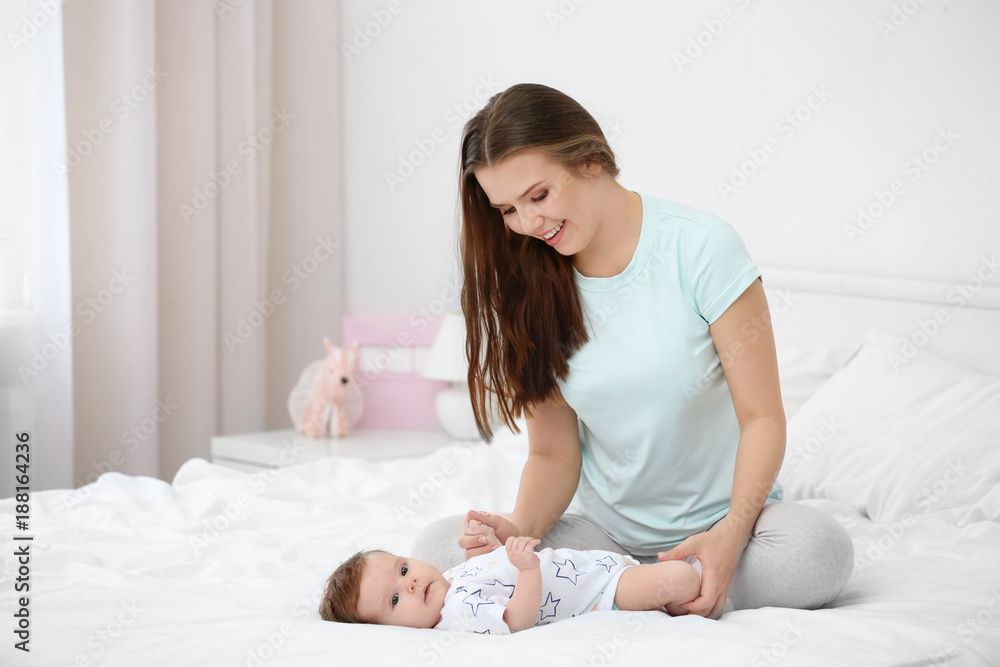 Young mother with her cute little baby at home Young mother with her cute little baby at home