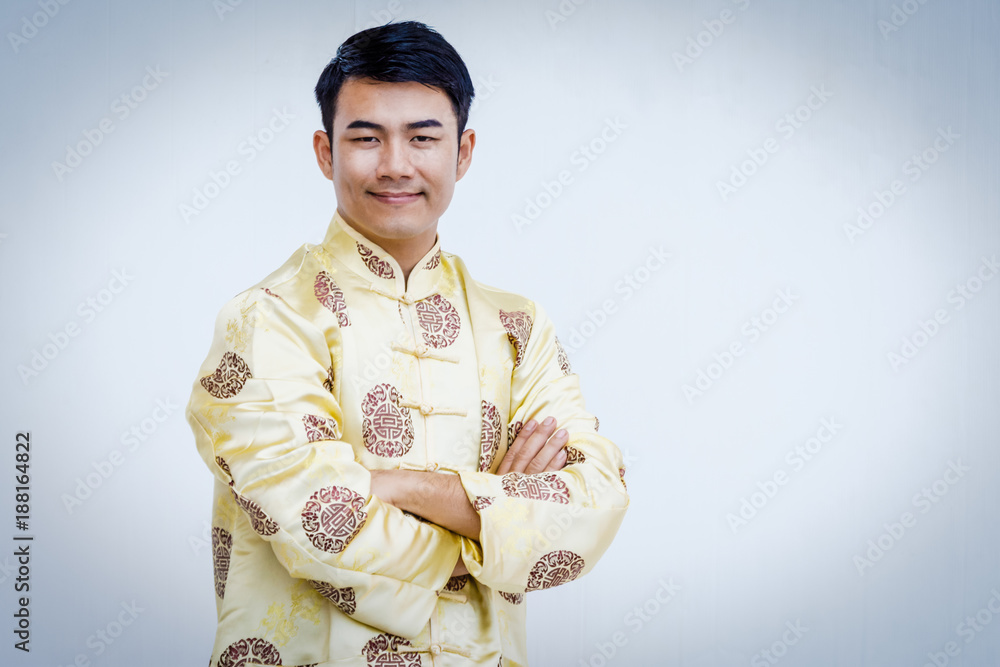 Happy Chinese man in traditional dress Happy Chinese man in traditional dress