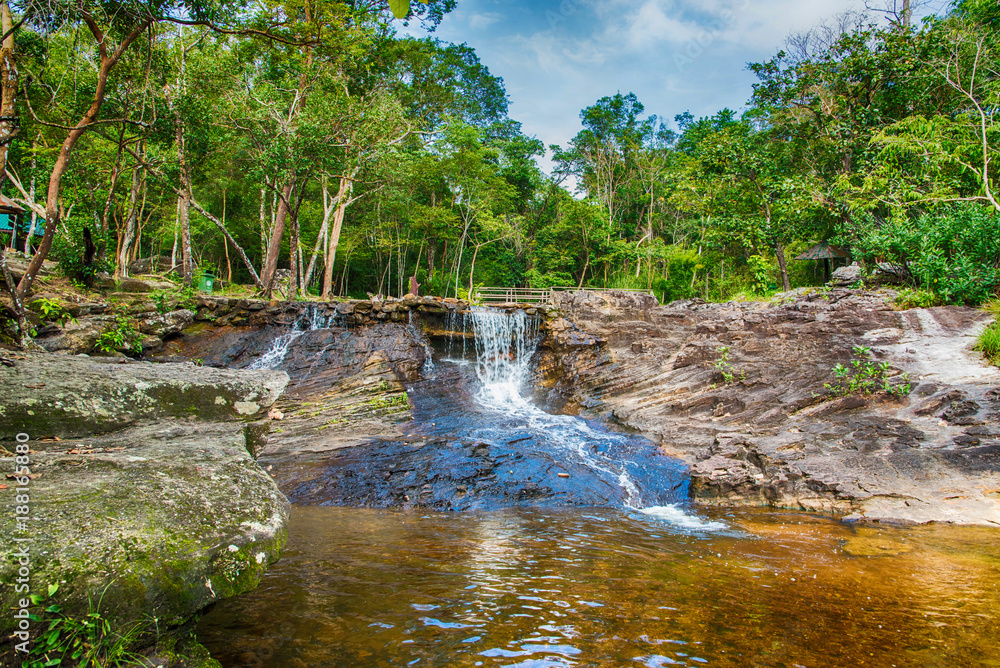 Fototapeta premium Kham Hom Waterfall at Huai Yang, Mueang Sakon Nakhon District, Thailand