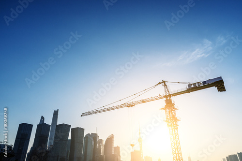 Canvas Print Crane and building construction site in shanghai china