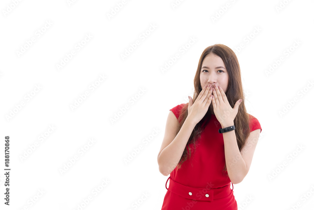 Beautiful young Asian woman in red casual dress , hand covering her mouth isolated on white background Beautiful young Asian woman in red casual dress , hand covering her mouth isolated on white background