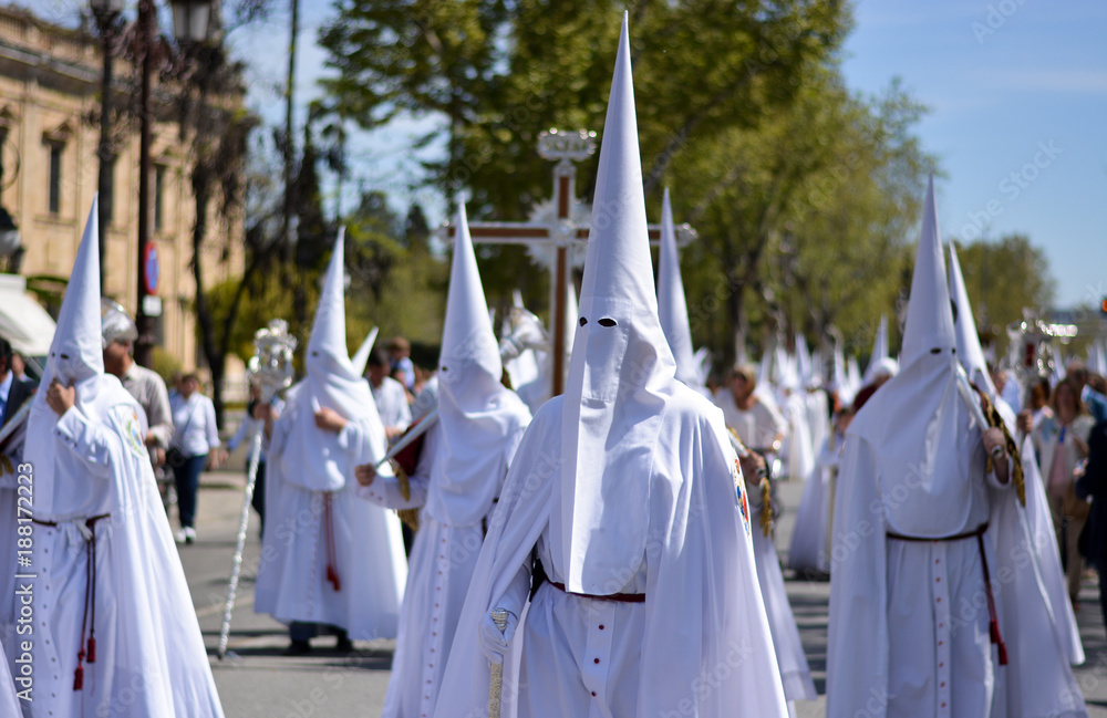 White hooded in procession