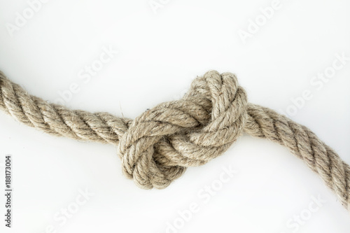Knotted rope on isolated white color