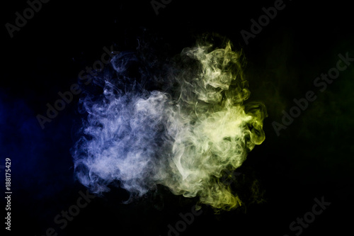 Cloud of smoke of blue and green isolated background. Background from the smoke of vape