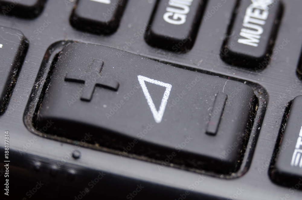 TV remote control photographed close up, you can see the volume change key. TV remote control photographed close up, you can see the volume change key.
