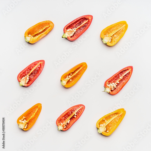 Flat lay of half paprika on white background, top view