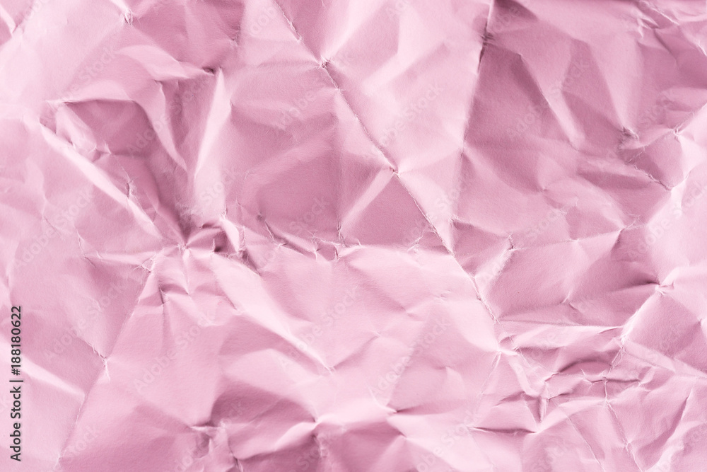 close-up shot of crumpled pink paper for background