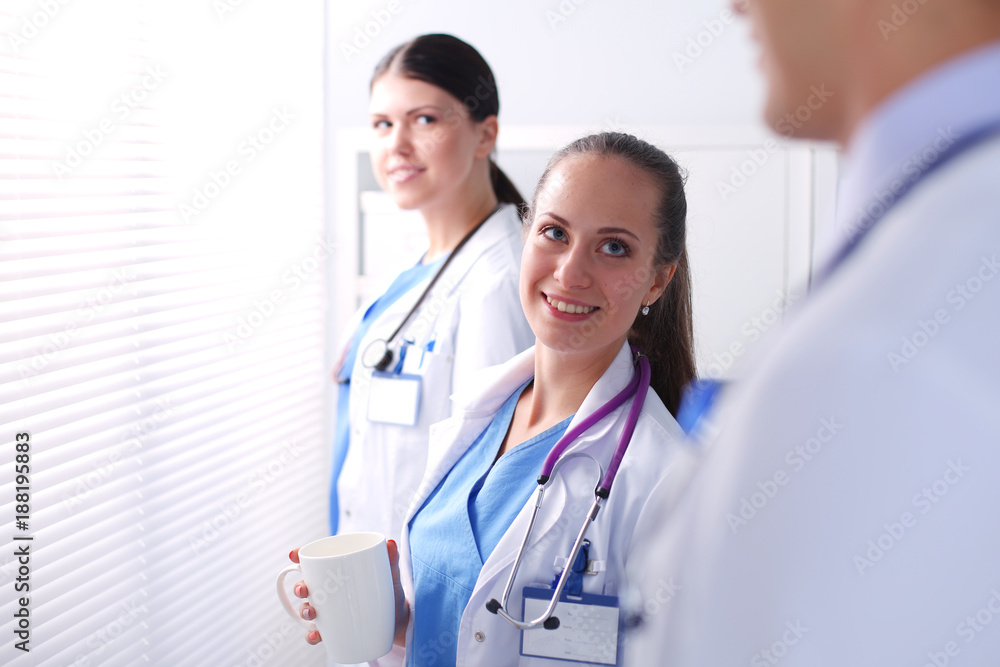 Young team or group of doctors standing in hospital . doctors Young team or group of doctors standing in hospital . doctors