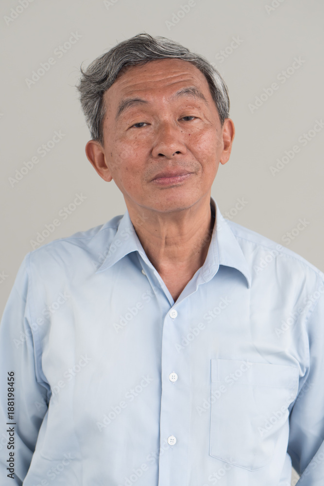 portrait of apathetic, neutral mood middle age, old, senior man looking at you portrait of apathetic, neutral mood middle age, old, senior man looking at you
