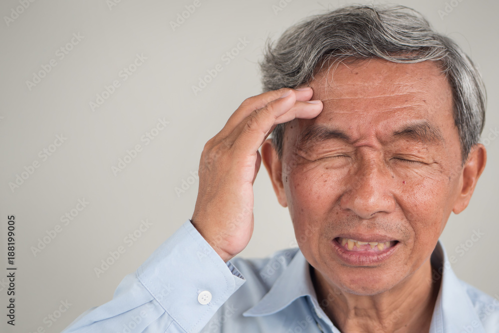 senior old man suffering from sharp acute headache pain, migraine, stress, hangover senior old man suffering from sharp acute headache pain, migraine, stress, hangover