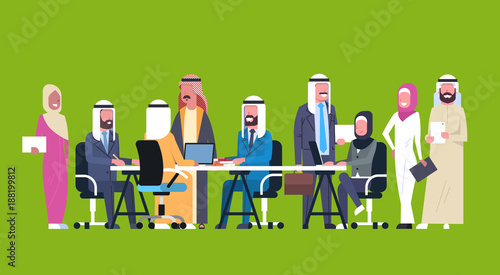 Group Of Arabic Business People Working Together Sit At Office Desk Muslim Workers Team Brainstorming Meeting Flat Vector Illustration