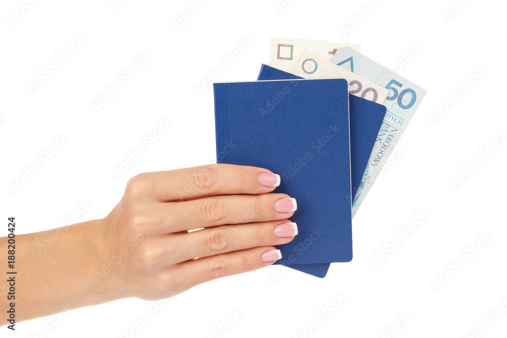 Hand holds passports with Polish zloty, isolated Hand holds passports with Polish zloty, isolated
