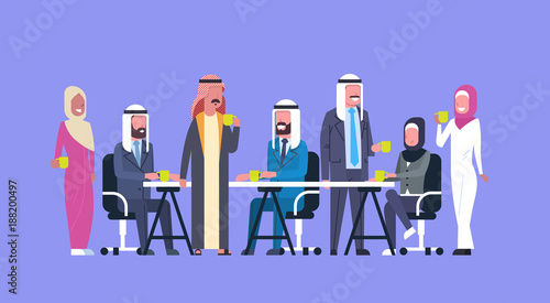 Group Of Arabic Business People Drink Tea Or Coffee Sit Together At Office Desk Muslim Workers Team At Break Flat Vector Illustration
