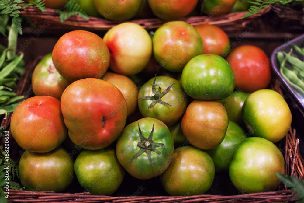 Fresh tomatoes background. Organic Ripe various tomatoes in market. Harvesting concept. Fresh tomatoes background. Organic Ripe various tomatoes in market. Harvesting concept.