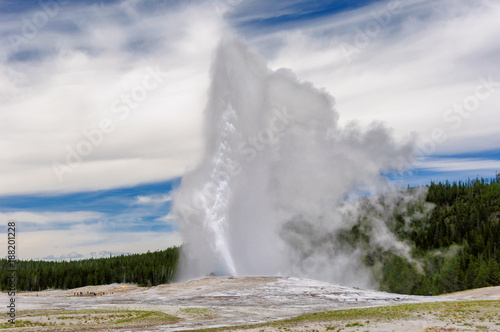 Eruption of Old Faithful geyser in Yellowstone National Park, Wyoming.