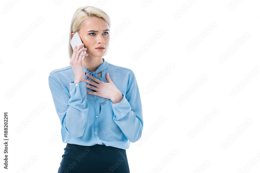 beautiful shocked businesswoman talking on smartphone, isolated on white beautiful shocked businesswoman talking on smartphone, isolated on white