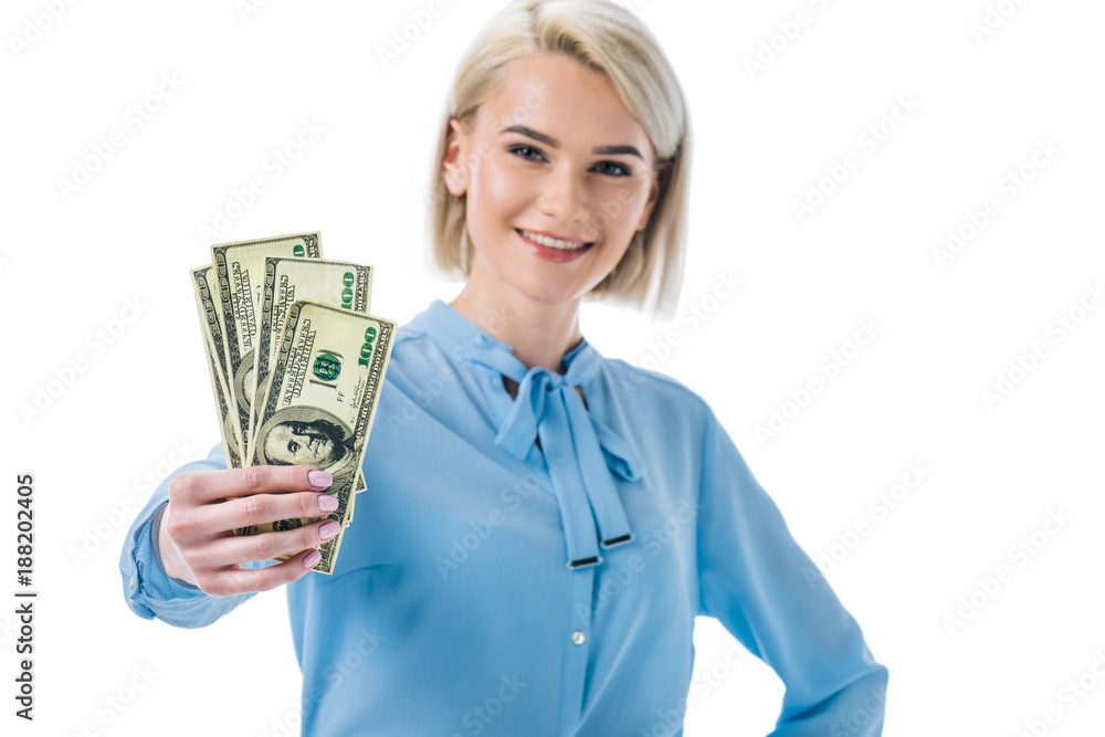 happy businesswoman holding dollar banknotes, isolated on white