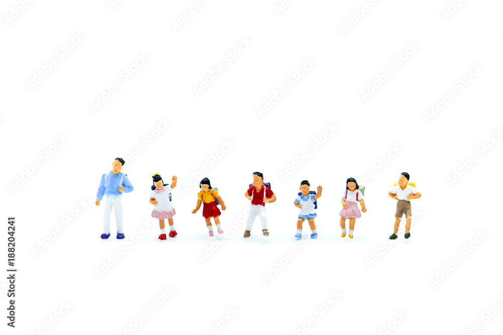 Miniature people : children with book and school background. Back to school concept Miniature people : children with book and school background. Back to school concept
