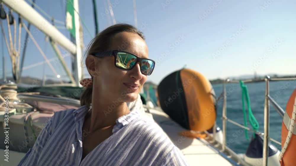Happy woman admire view while sailing boat on sea
Happy woman admire view while sailing boat on sea