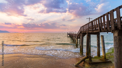 beautiful old wood bridge with sunset