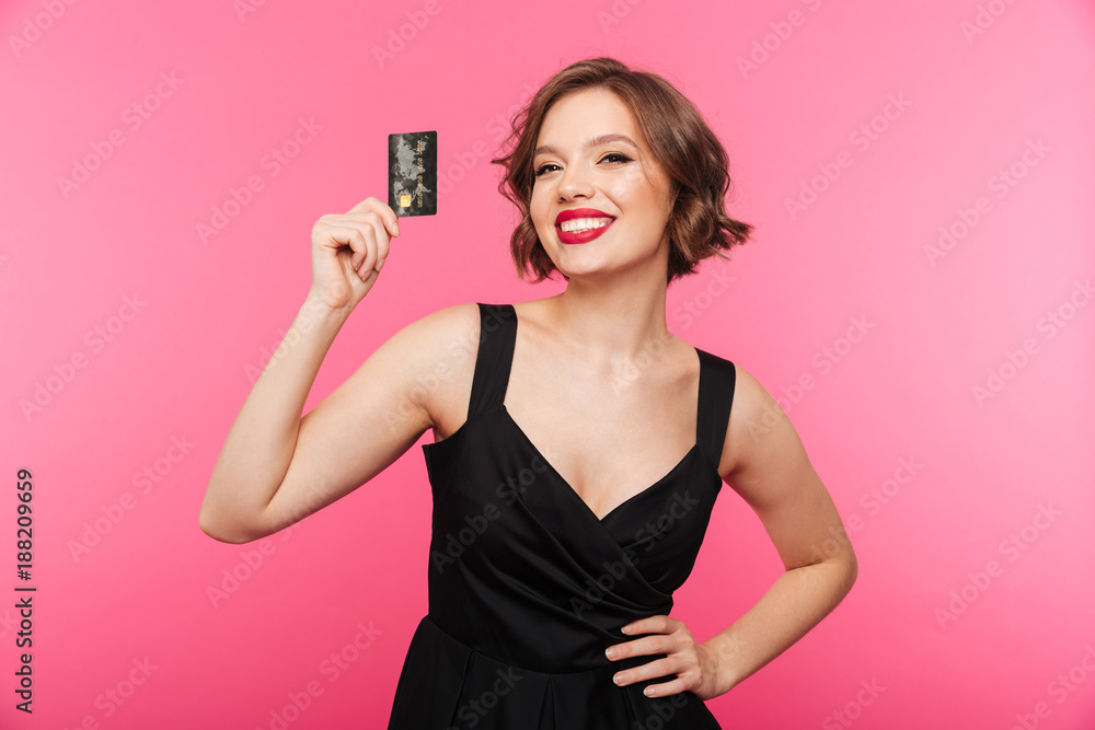 Portrait of a cheery girl dressed in black dress Portrait of a cheery girl dressed in black dress