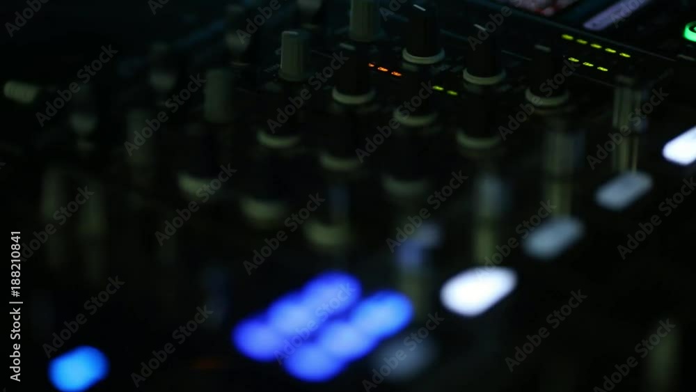 DJ powered by dance party in the night clubs in the professional equipment. DJ powered by dance party in the night clubs in the professional equipment.