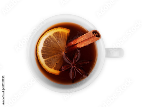Cup of delicious tea with lemon and cinnamon. Isolated on white