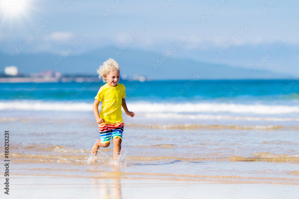 Child on tropical beach. Sea vacation with kids. Child on tropical beach. Sea vacation with kids.