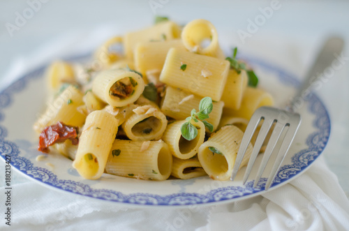 Pasta pesce ed erbe aromatiche photo