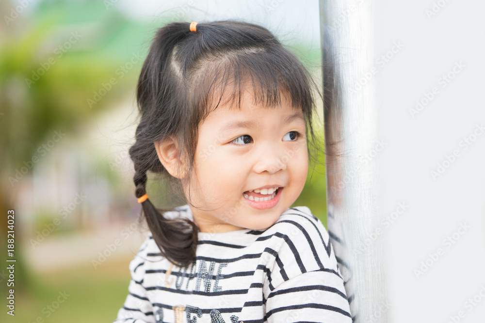 Little girl child showing front teeth with big smile: Healthy happy funny smiling face young adorable lovely female kid with new tooth dental loss: Joyful portrait of asian elementary school student Little girl child showing front teeth with big smile: Healthy happy funny smiling face young adorable lovely female kid with new tooth dental loss: Joyful portrait of asian elementary school student
