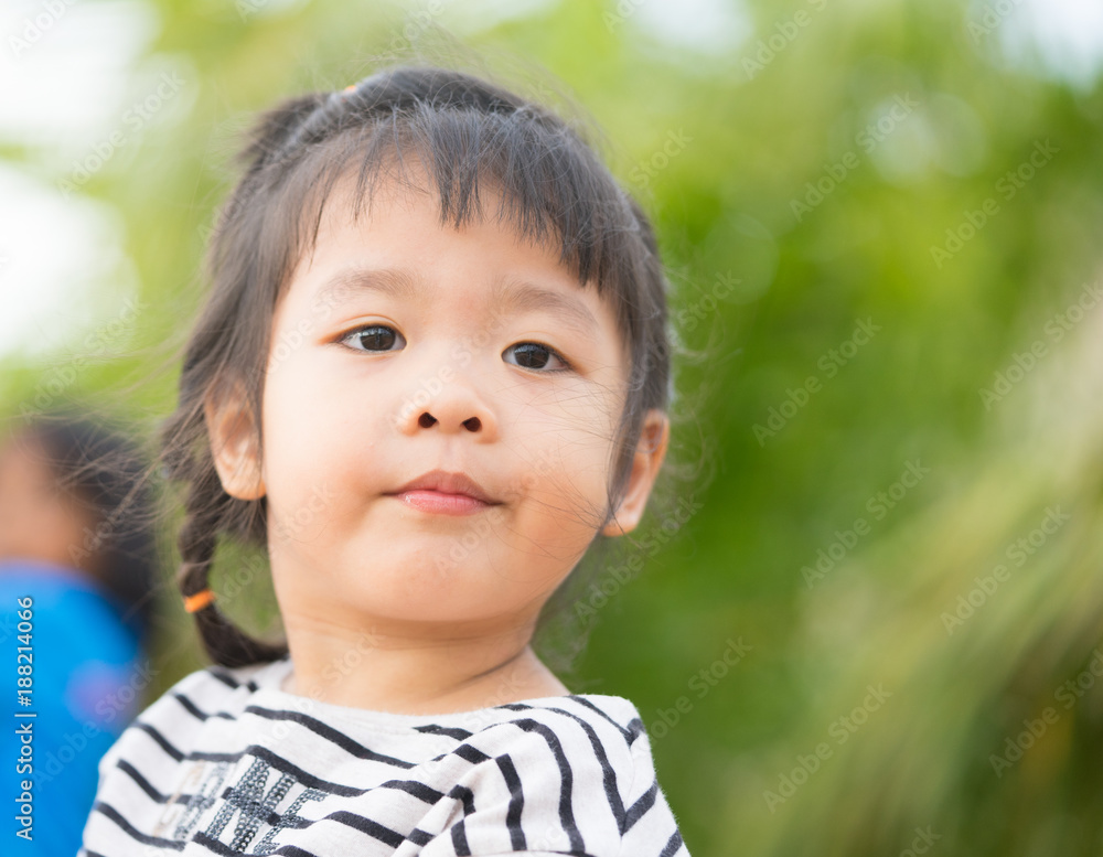 Little girl child showing front teeth with big smile: Healthy happy funny smiling face young adorable lovely female kid with new tooth dental loss: Joyful portrait of asian elementary school student Little girl child showing front teeth with big smile: Healthy happy funny smiling face young adorable lovely female kid with new tooth dental loss: Joyful portrait of asian elementary school student