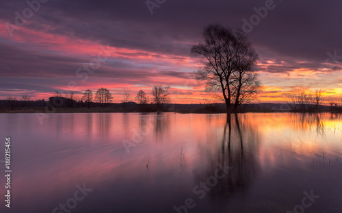 A colorful sunrise by the river © Mariusz