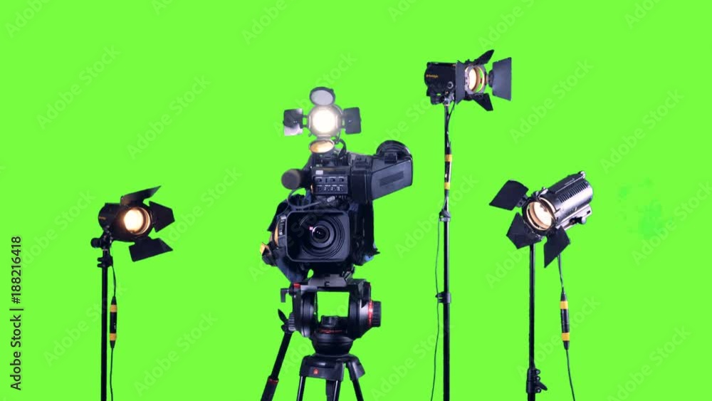 Professional broadcast studio video camera and spotlights. Professional broadcast studio video camera and spotlights.