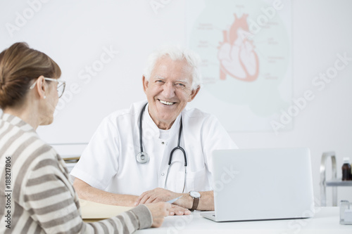 Cardiologist with patient