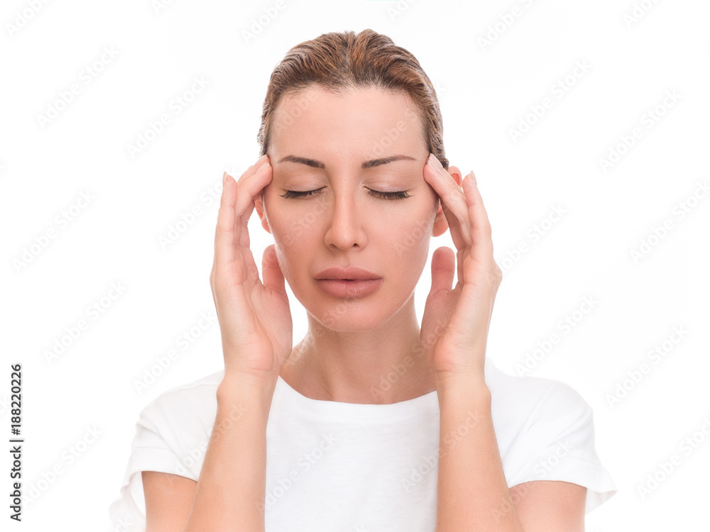 Beautiful woman with a headache holding head, isolated on white background. Beautiful woman with a headache holding head, isolated on white background.