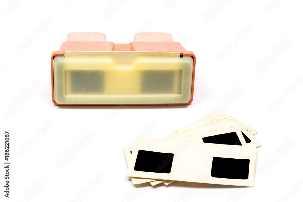 Red retro stereoscope with slides frames isolated on white background Red retro stereoscope with slides frames isolated on white background