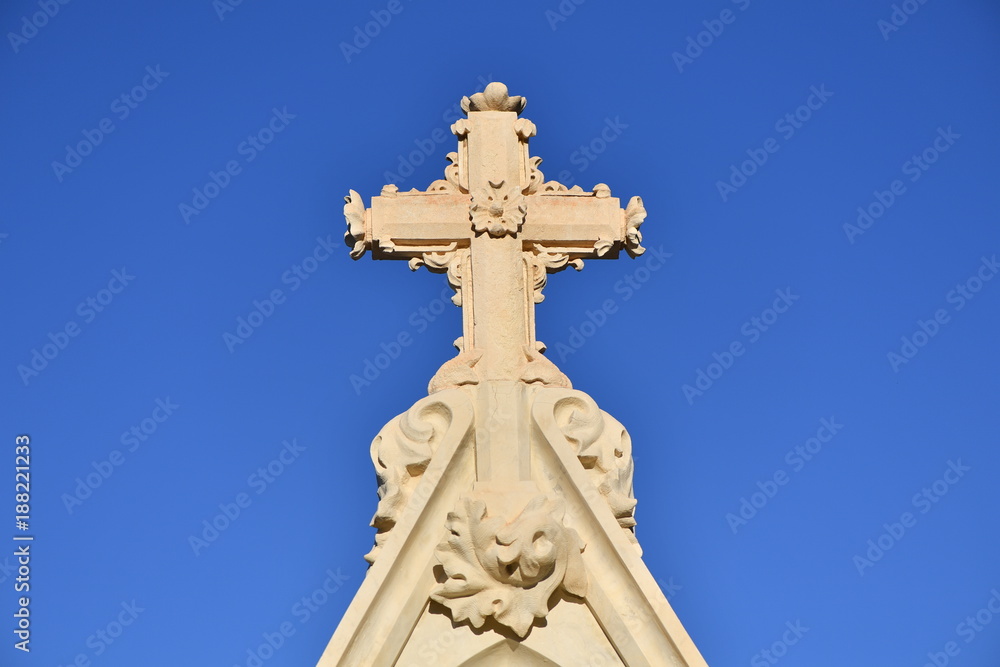 Christian cross on a church in Spain