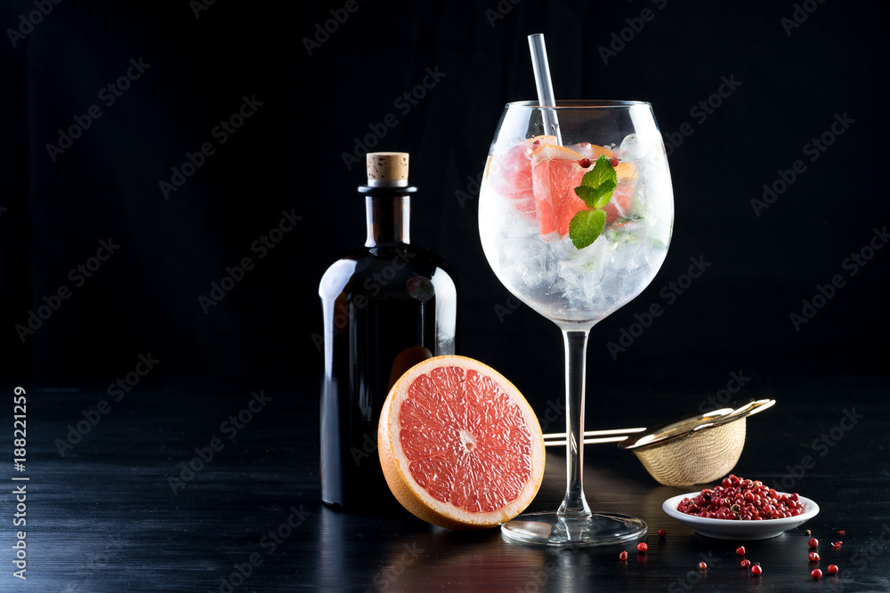 fancy gin and tonic selection drink alcohol cocktail craft fresh fruit spices mint glass bar