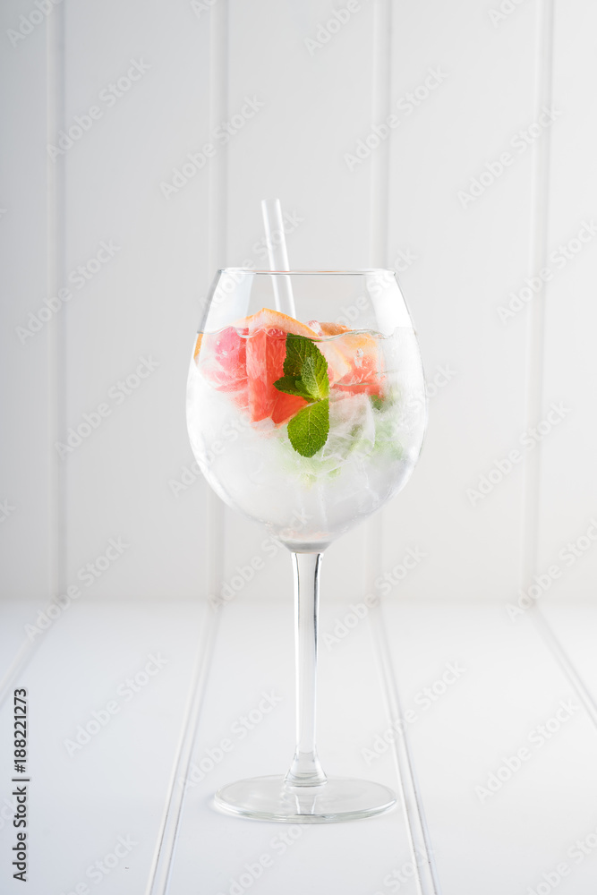fancy gin and tonic selection drink alcohol cocktail craft fresh fruit spices mint glass bar