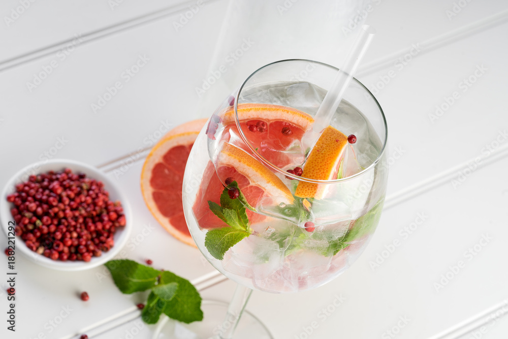 fancy gin and tonic selection drink alcohol cocktail craft fresh fruit spices mint glass bar
