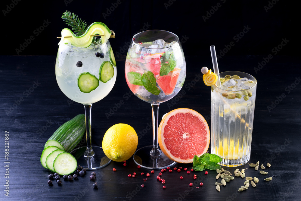 fancy gin and tonic selection drink alcohol cocktail craft fresh fruit spices mint glass bar