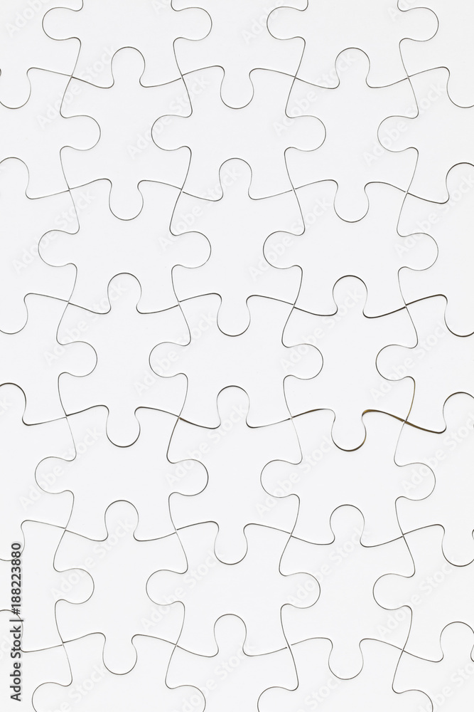 White jigsaw puzzle pieces background. Business solution concept White jigsaw puzzle pieces background. Business solution concept