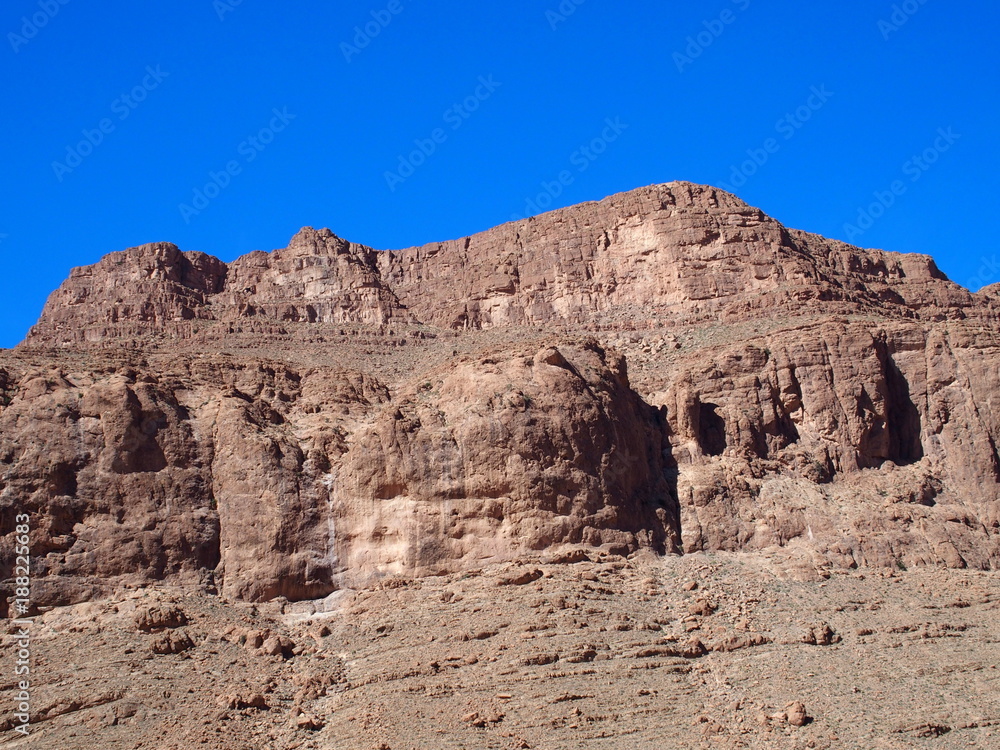 Rocky slope of TODGHA GORGE canyon landscape in MOROCCO, eastern part of High Atlas Mountains range at Dades Rivers