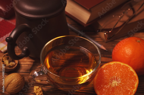 Tea time with books and oranges