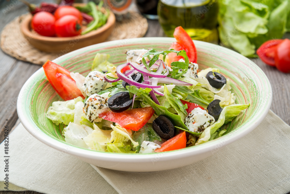 Greek salad with fresh vegetables, feta cheese Greek salad with fresh vegetables, feta cheese