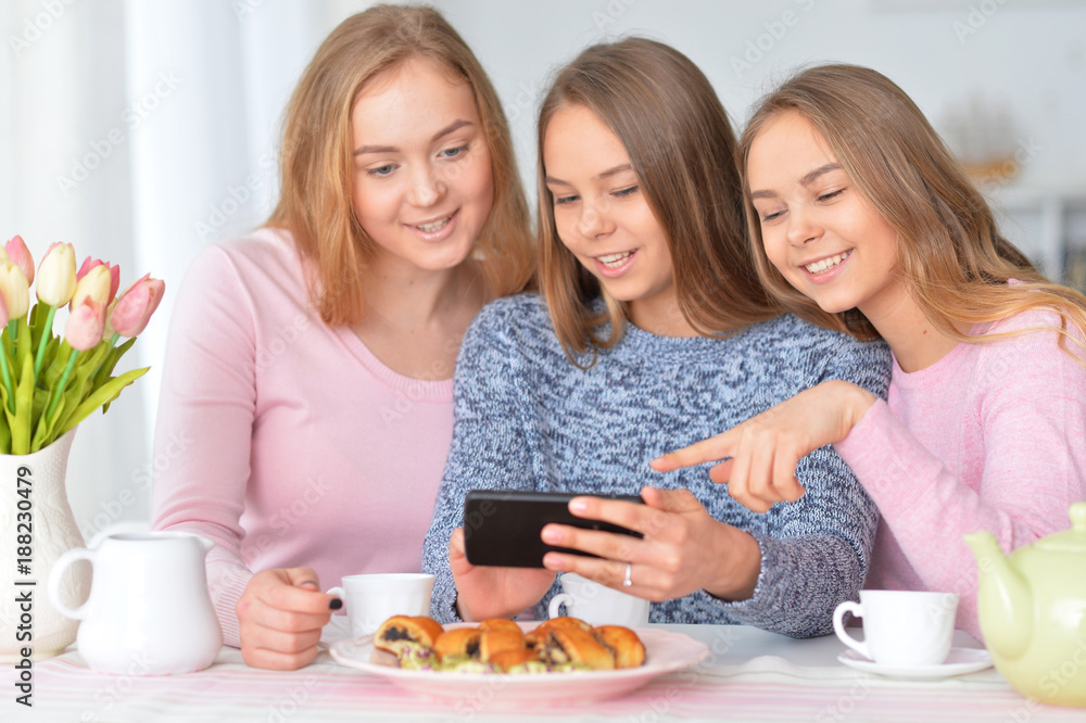 Group of teenage girls with smartphone