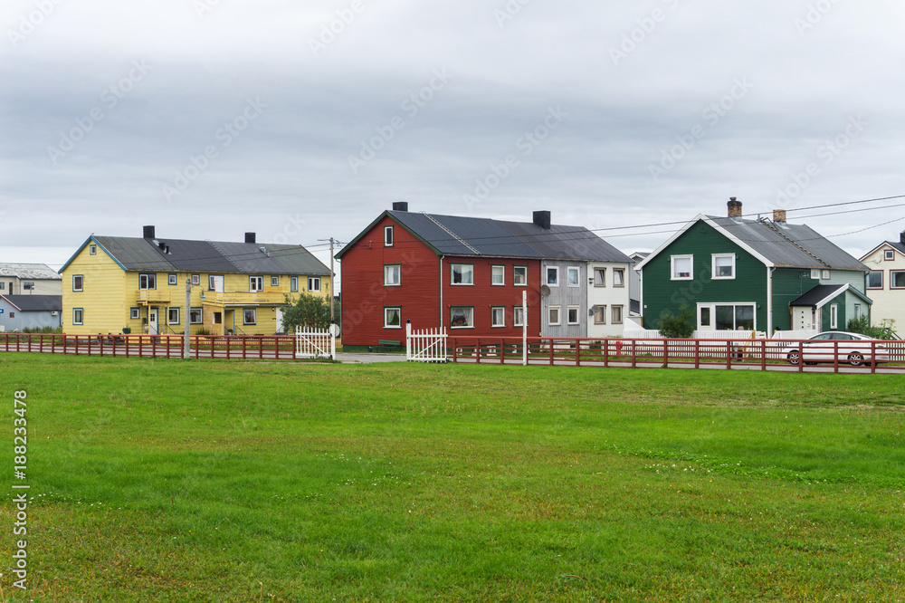 Multicolored houses in the town of Vardo, Finnmark, Norway Multicolored houses in the town of Vardo, Finnmark, Norway
