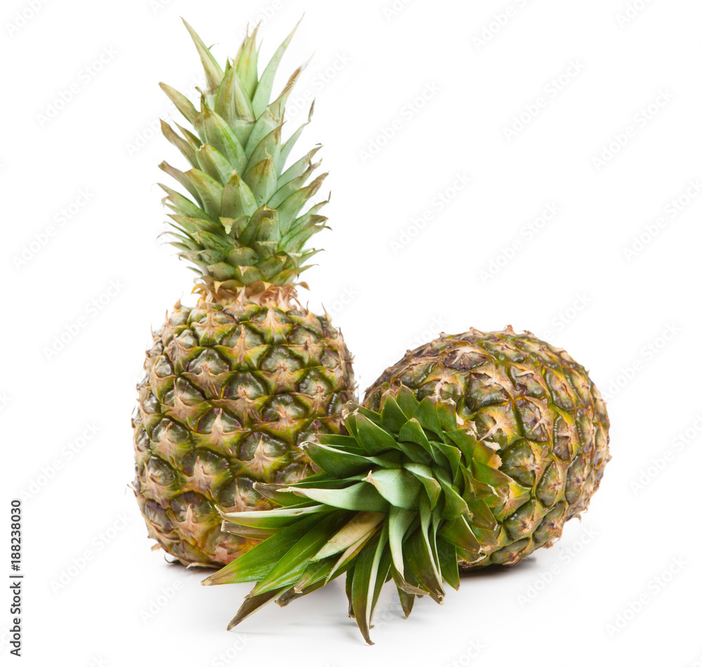 two big pineapples on a white background two big pineapples on a white background