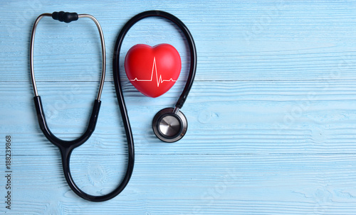 фотографія Red heart with stethoscope.